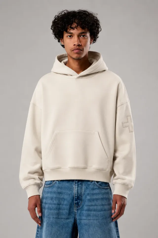 Cross-Sleeve Hoodie worn by model